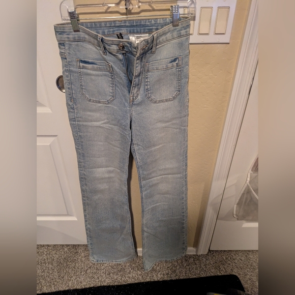 High Waisted Light Blue Flare Jeans With Front Pockets - Picture 2 of 10